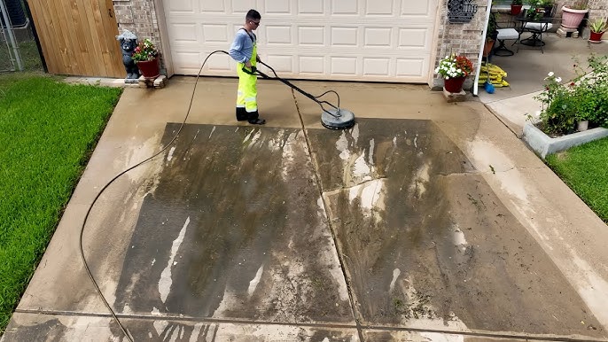 Driveway pressure washing in progress